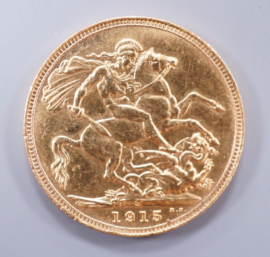 A George V 1915 gold sovereign.